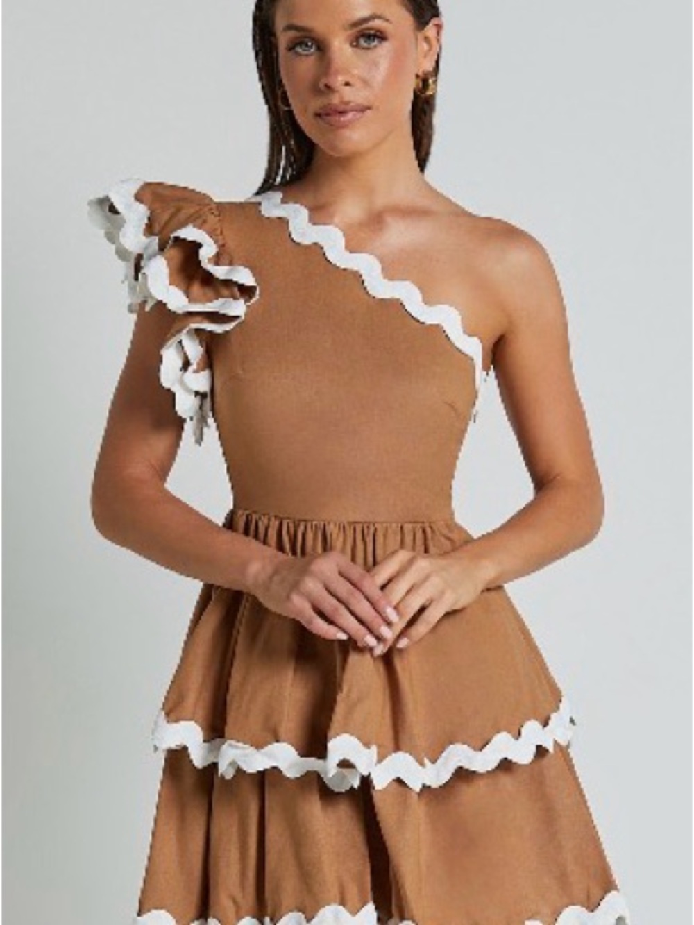 Showpo Camel One-Shoulder Ruffle Tiered Mini Dress with White Trim